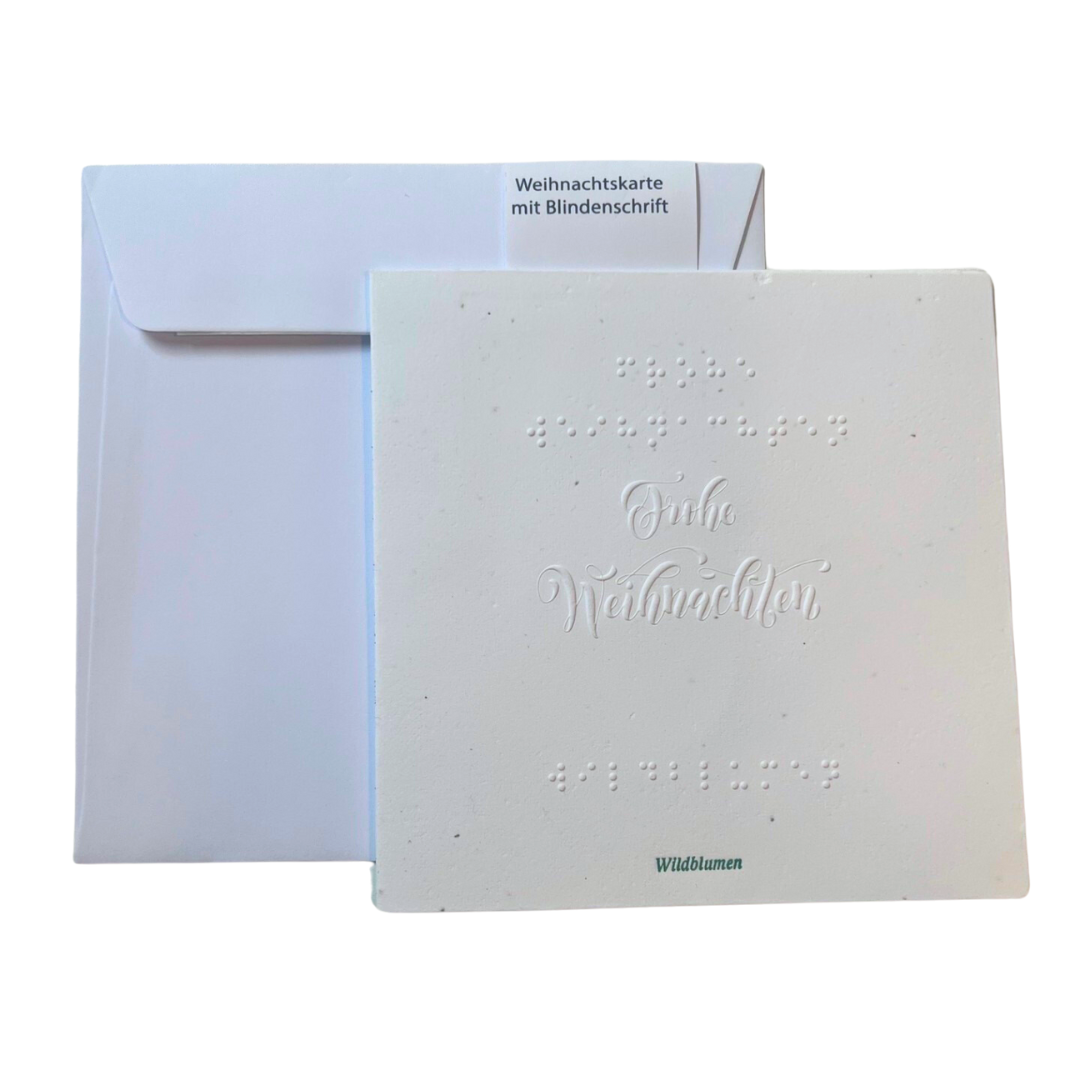 Postkarte aus Samenpapier mit geprägter Blindenschrift und Briefumschlag.