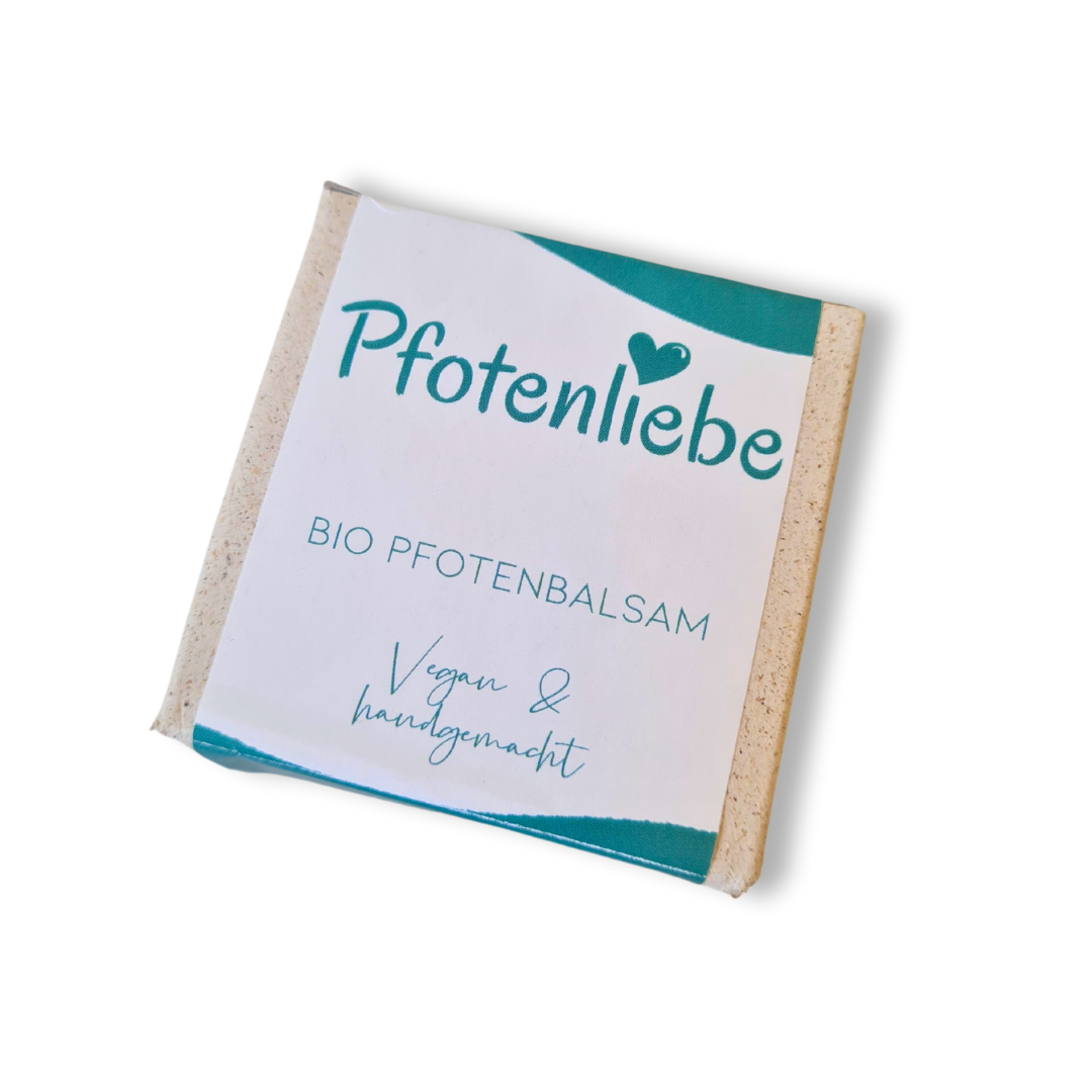 Bio-Pfotenbalsam in einer Verpackung aus Graspapier mit Aufkleber.
