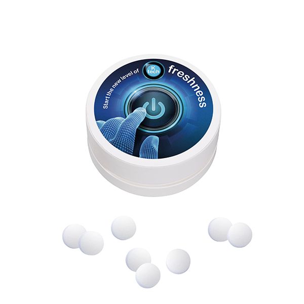 Papierdose befüllt mit Pfefferminzbonbons