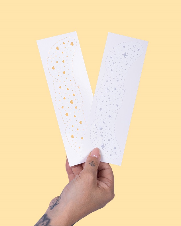 Sommersprossen-Tattoos Herz und Sterne in silber und gold