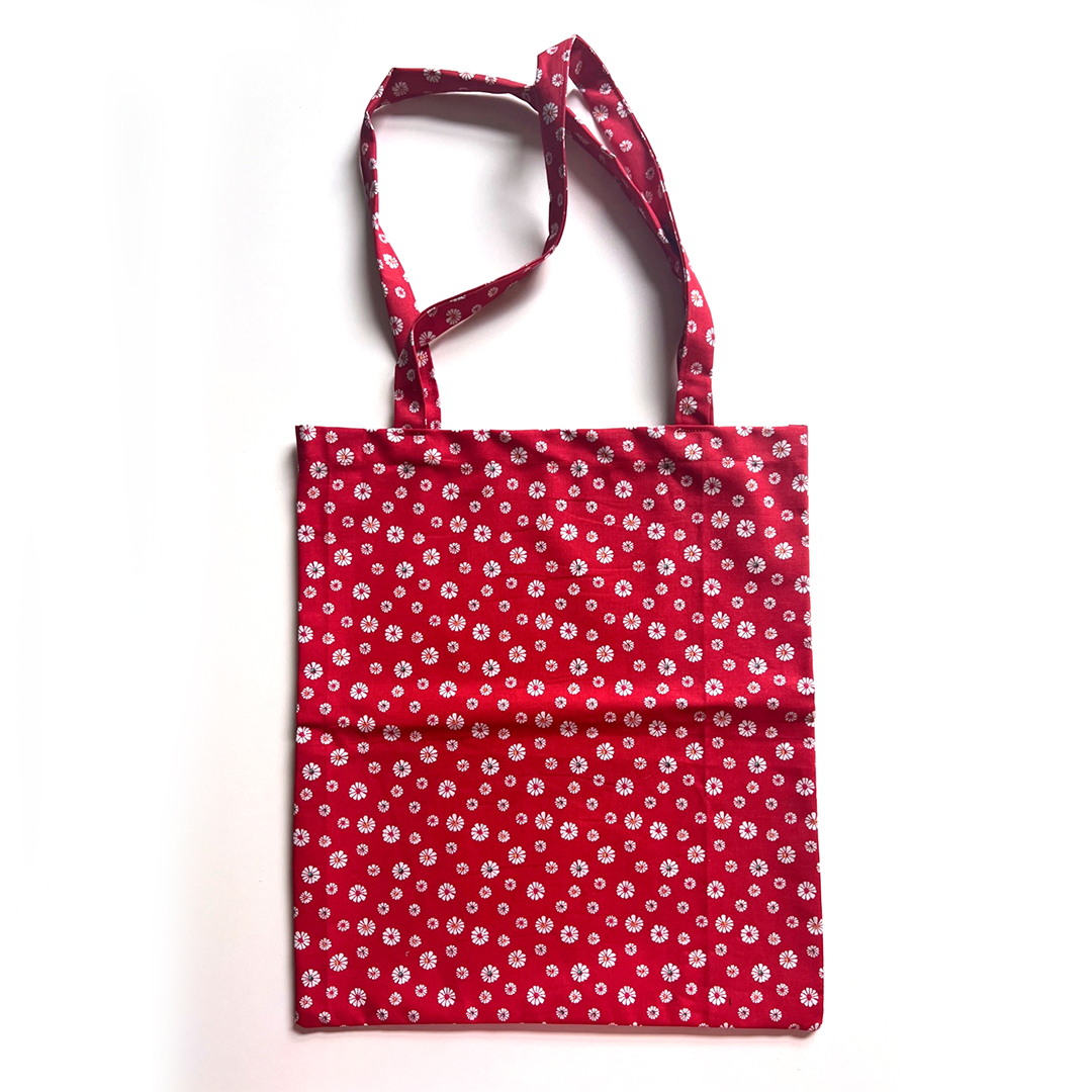 Tasche aus recycelter Baumwolle mit Gänseblümchen-Druck in rot