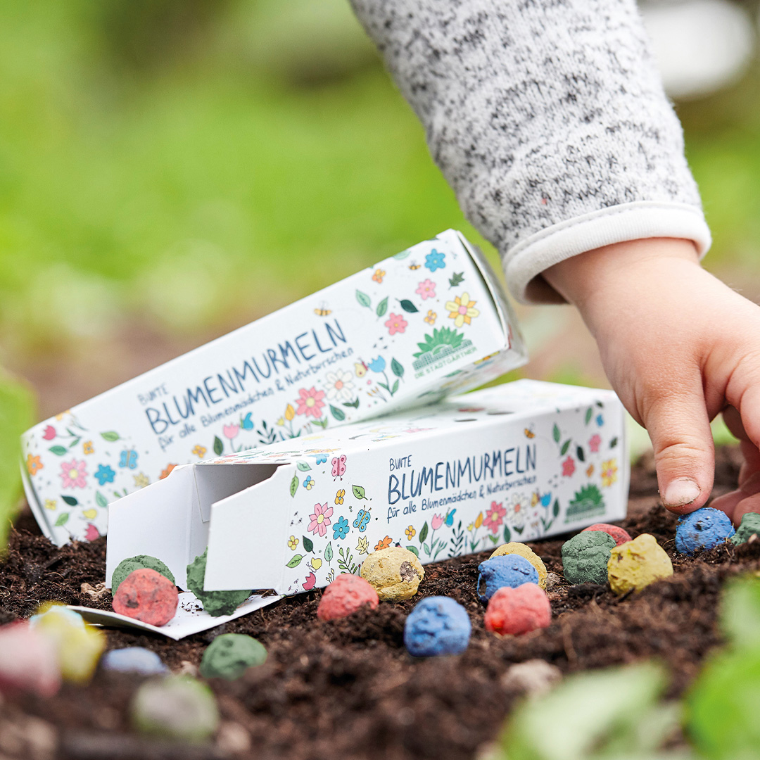 Blumenmurmeln mit Verpackung