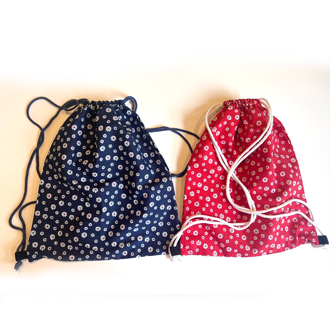 Rucksacktaschen mit Gänseblümchen aus recycelter Baumwolle